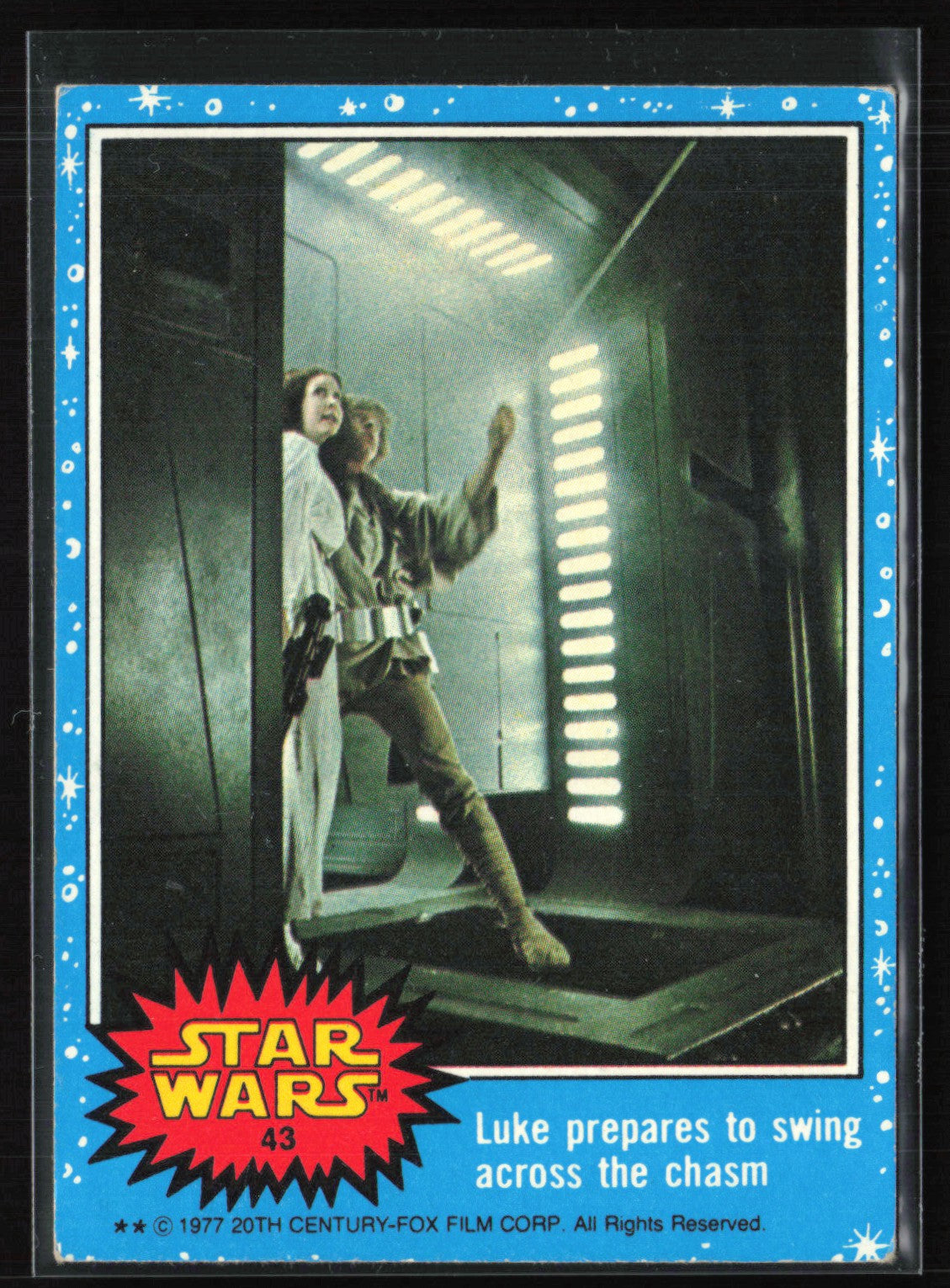Luke prepares to swing across the chasm 1977 Topps Star Wars